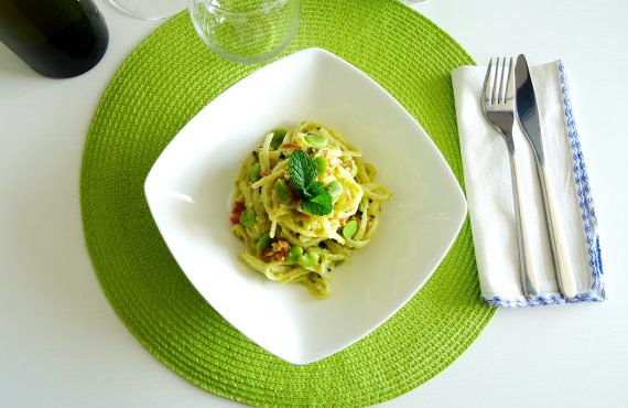 Linguine with fava and spicy salami